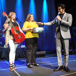 Tupelo Hardware gives away a guitar to a lucky fan at the Semifinal Round in Memphis.